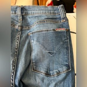 Medium wash, Hudson skinny jeans. No rips.